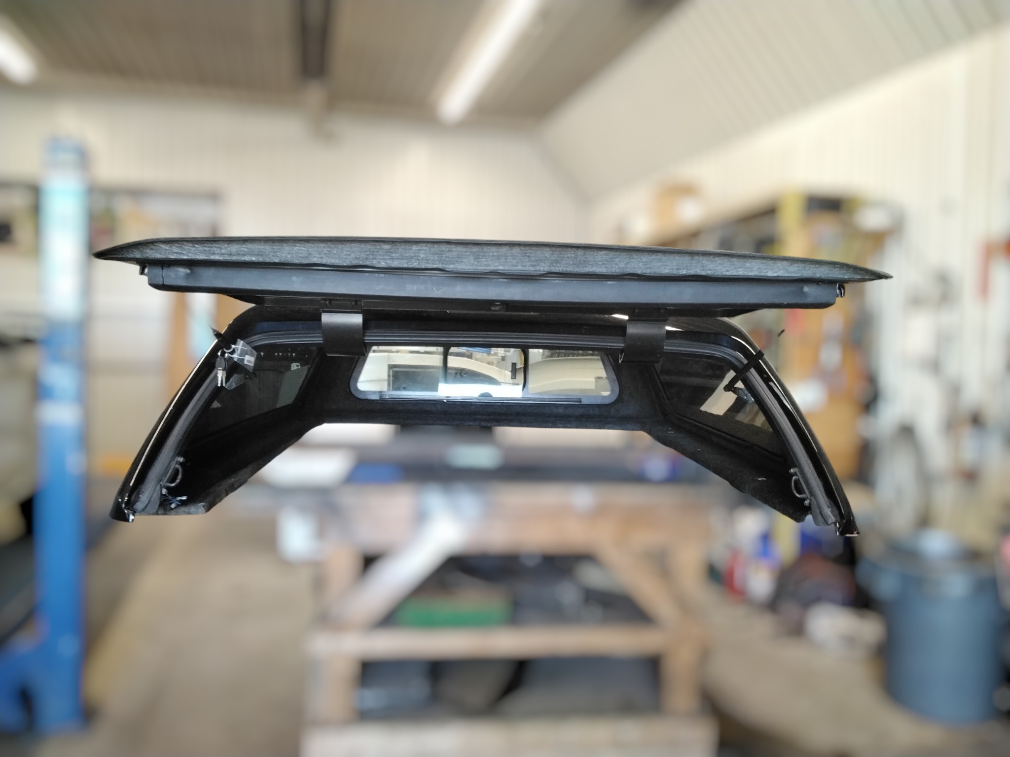 2020 - 2027 Chevrolet Silverado HD 2500/3500 6'9 99F Black ARE Truck Cap 4 2020 - 2027 Chevrolet Silverado HD 2500/3500 6'9 99F Black ARE Truck Cap - Image 4